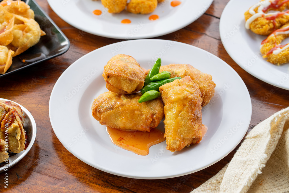 Indonesian specialities made from tofu are served on the table. Indonesian specialities made from tofu are served on the table.