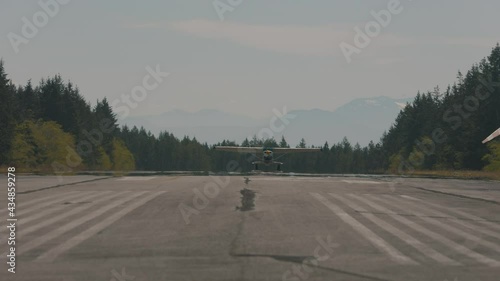 Cessna aircraft landing on a runway  Texada Island British Columbia Sunshine Coast Canada photo