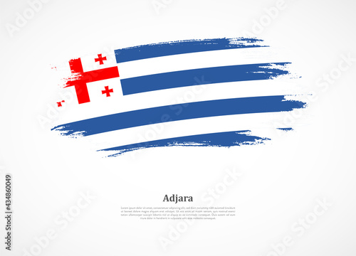 Happy national day of Adjara with national flag on grunge texture