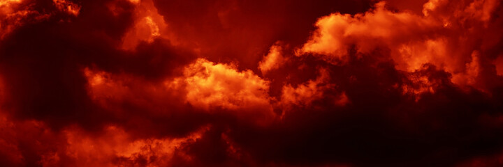    Fiery red dramatic sky. Fire, war, explosion, catastrophe, flame. Horror concept. Web banner. Bloody red background with copy space for design.              