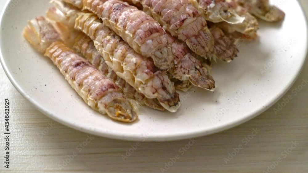 steamed crayfish or mantis shrimps or stomatopods with spicy seafood sauce steamed crayfish or mantis shrimps or stomatopods with spicy seafood sauce