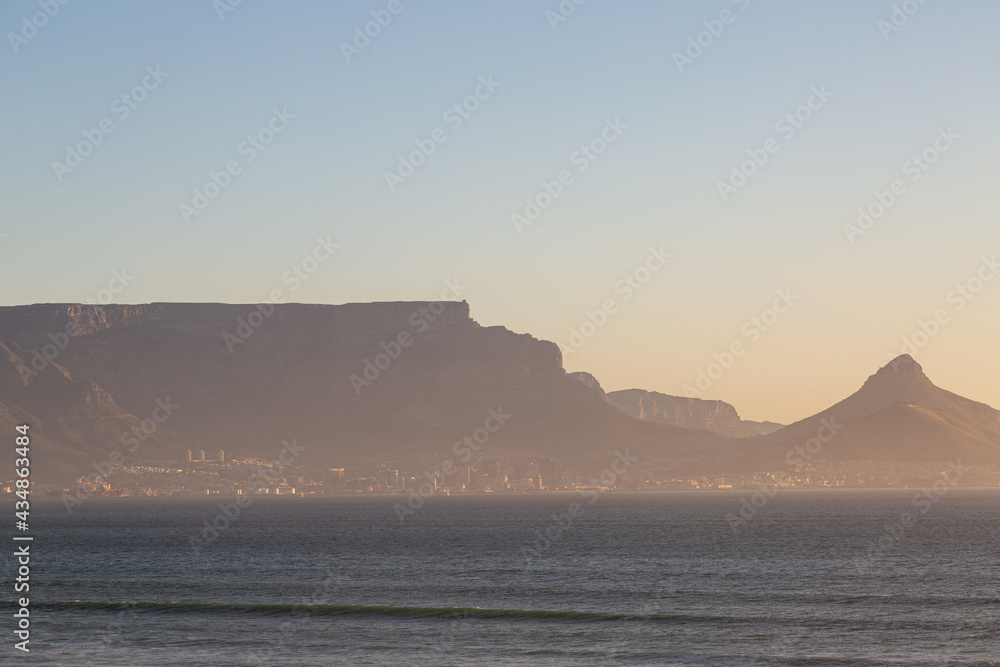 Look onto the Table Mountain in early evening sun seen from Bloubergstrand in Cape Town, Western Cape of South Africa