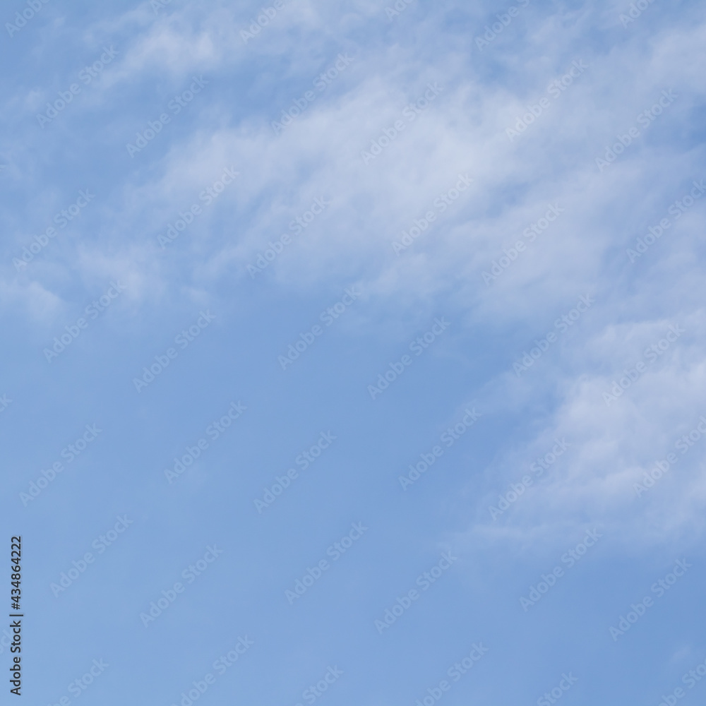 Background of blue sky with white clouds