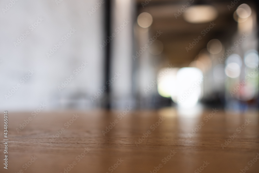 Wooden table top with blurred background in cafe Wooden table top with blurred background in cafe