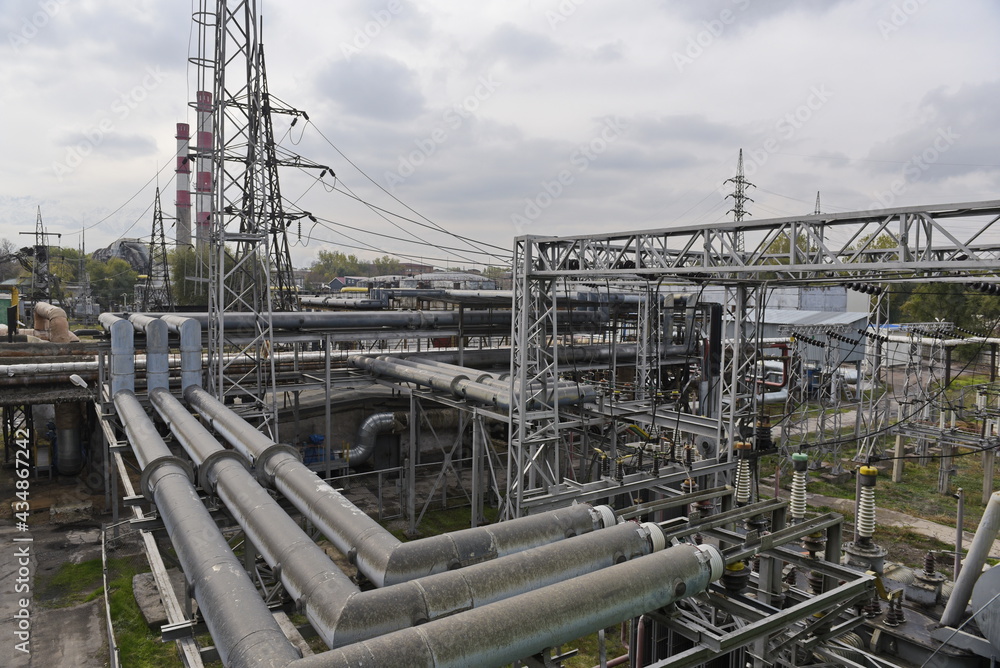 Almaty, Kazakhstan - 10.23.2015 : The territory of the thermal power plant with pipes and various industrial compartments Almaty, Kazakhstan - 10.23.2015 : The territory of the thermal power plant with pipes and various industrial compartments