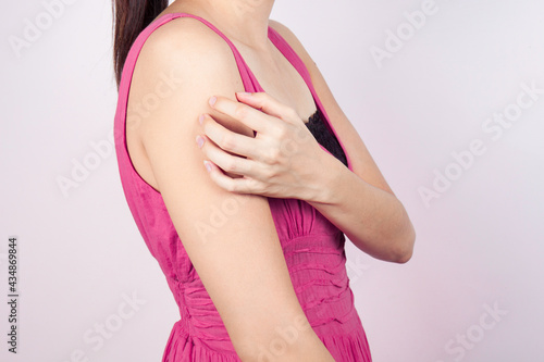 Wallpaper Mural Young woman suffering from itching on her skin. Torontodigital.ca