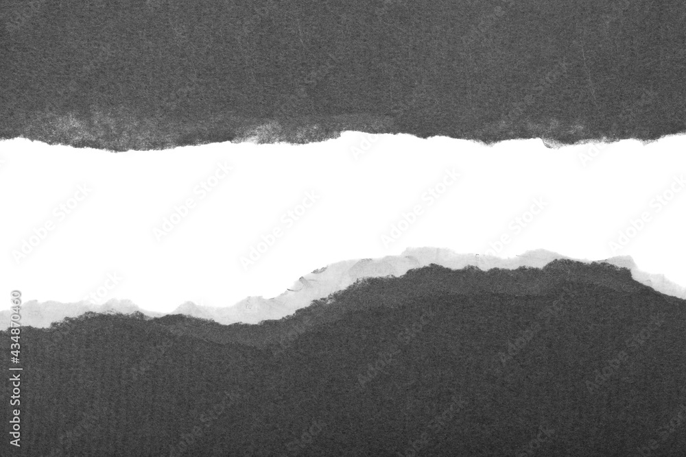 Gray torn paper isolated on white background close-up. Gray torn paper isolated on white background close-up.