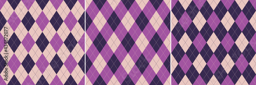 Argyle pattern set in bright purple and pink. Seamless geometric vector graphic backgrounds for wallpaper, socks, sweater, gift paper, other modern spring autumn womenswear fashion textile print.