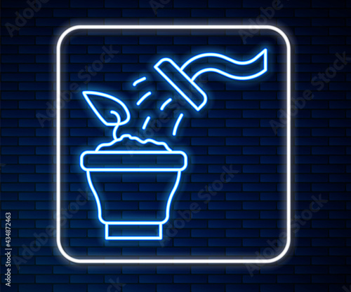 Glowing neon line Spraying a house plant with a spray gun icon isolated on brick wall background. Moistening of foliage. Care for home flowers. Vector