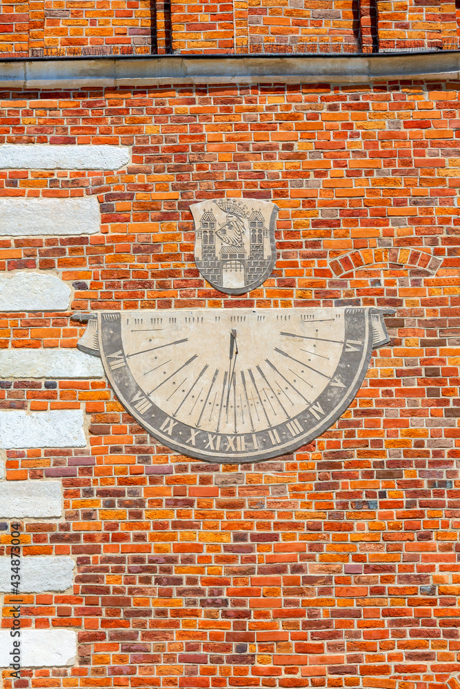 Sundial made using the sgraffito technique on the wall of Sandomierz gothic Town Hall, Sandomierz, Poland