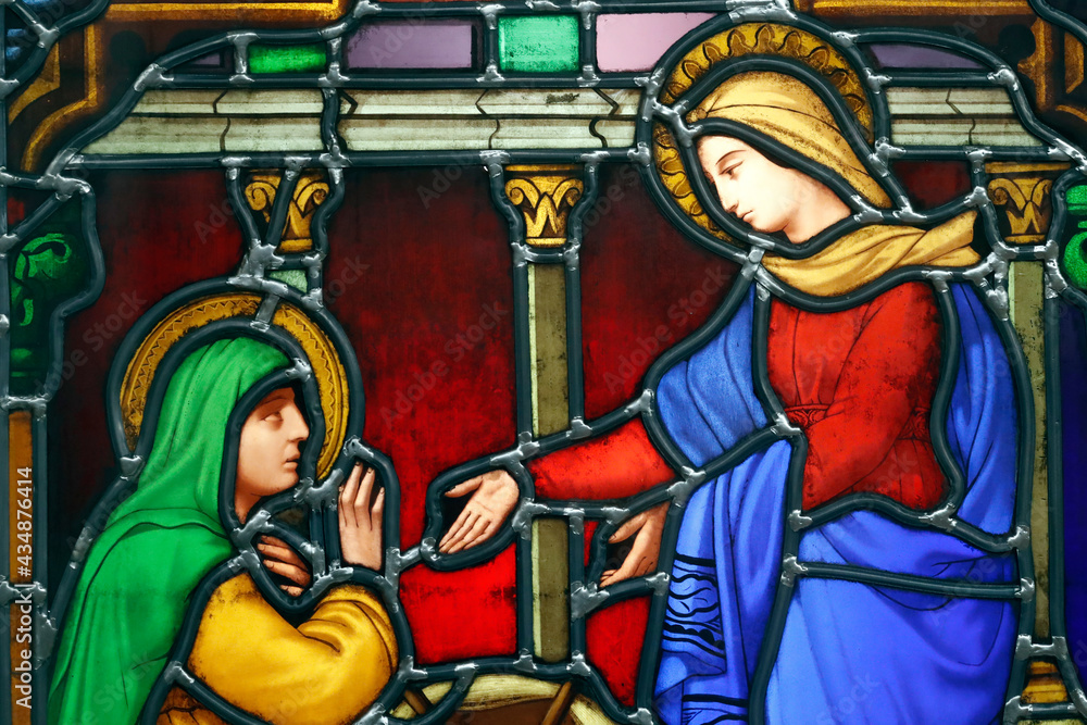 Notre Dame ( our Lady ) d'Aix les Bains church. Stained glass window. The Visitation of Virgin Mary is the visit of Mary with Elizabeth as recorded in the Gospel of Luke. Aix les Bains. France. Notre Dame ( our Lady ) d'Aix les Bains church. Stained glass window. The Visitation of Virgin Mary is the visit of Mary with Elizabeth as recorded in the Gospel of Luke. Aix les Bains. France.