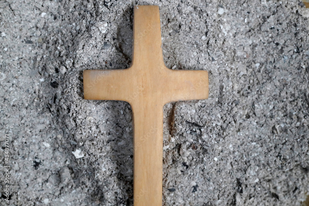 Cross with ashes. Ash Wednesday. Lent season. France.