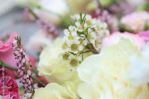 Floral composition of fresh roses, eustoma, ranunculus and astilba. Floral background.