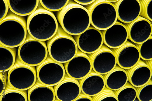tuyaux tuyau jaune noir travaux flexibles tubes tas empil  s plein cadre gros plan pile
