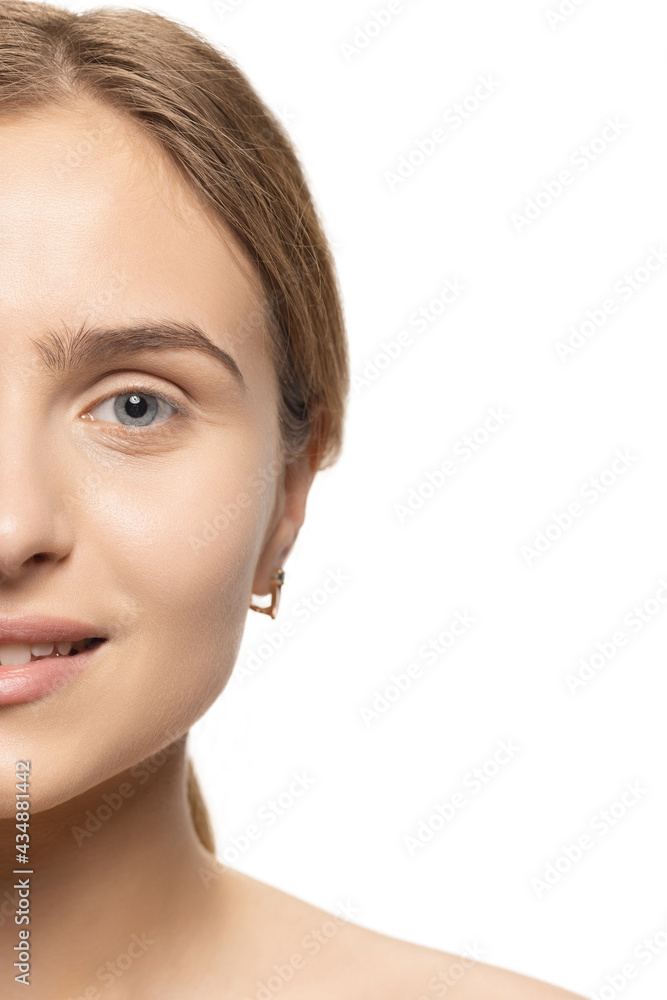 Close up portrait of young female fashion model isolated on white studio background. Beautiful caucasian woman with well-kept skin. Close up portrait of young female fashion model isolated on white studio background. Beautiful caucasian woman with well-kept skin.