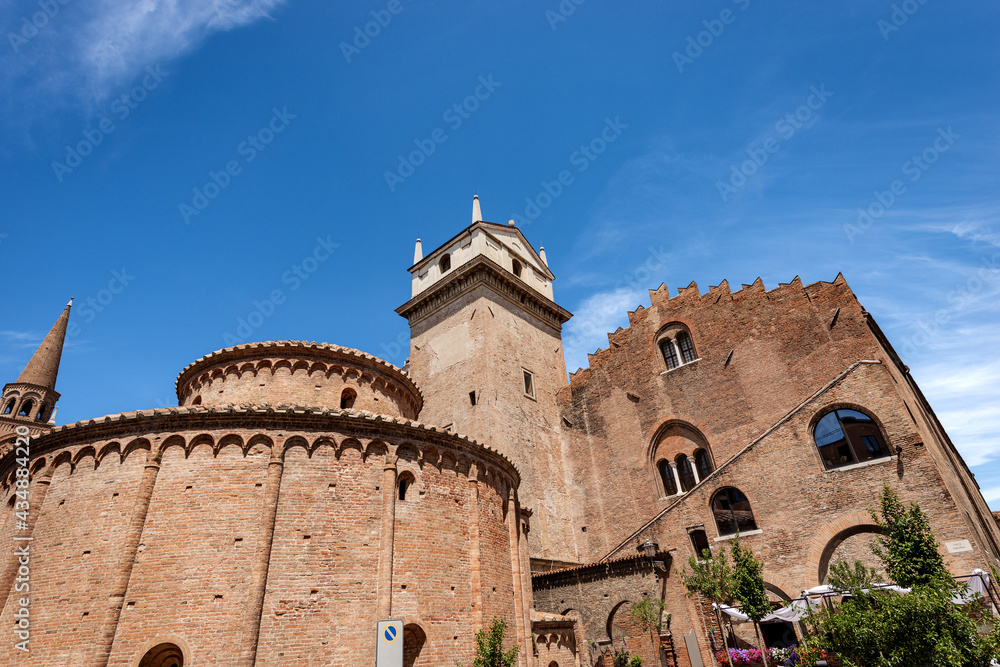 Mantua, Church Rotonda di San Lorenzo in Romanesque style (1083-XI century) and the medieval Palazzo della Ragione (XI-XII century) with the clock tower, Piazza delle Erbe, Lombardy, Italy, Europe.