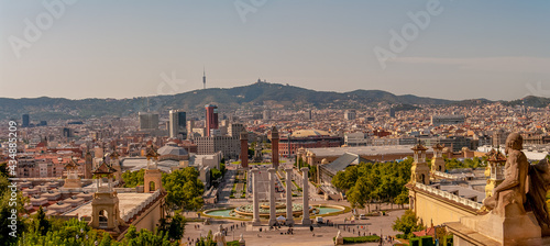 Obraz na płótnie Panoramic view over modern and old districts in historical downtown of Barcelona, Spain, cityscape, at summer sunset colors. w salonie