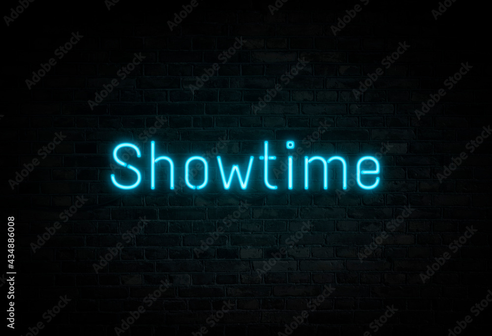 Illuminated and glowing blue Showtime neon sign on dark brick wall.