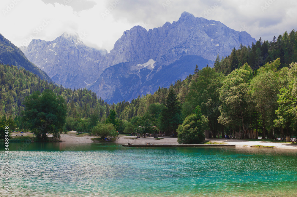 clean transparent cold turquoise water of Jasna lake pearl of Slovenian alpine sights