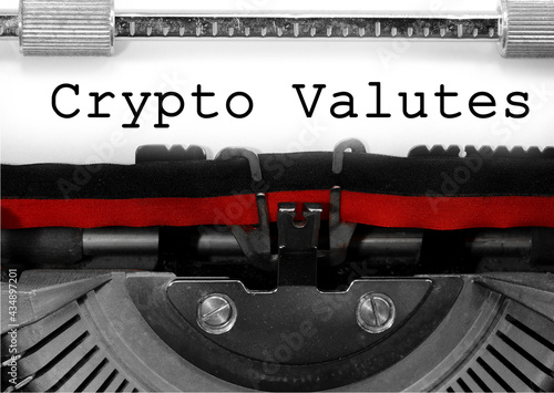 Text Crypto Valutes written with an old typewriter on paper photo