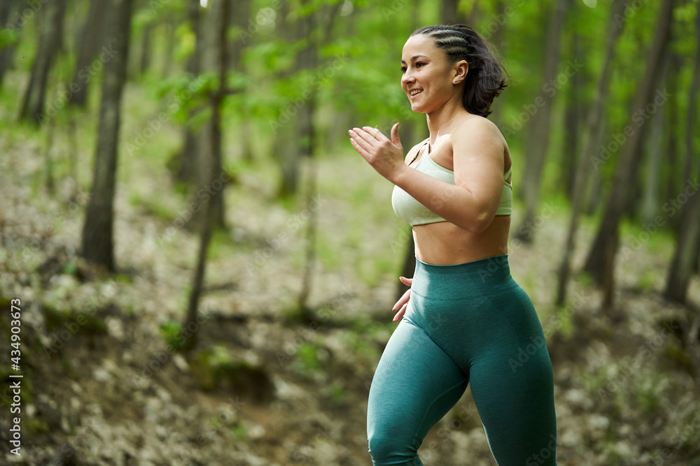 Plus size runner woman in the forest Plus size runner woman in the forest