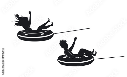 man and woman riding tube silhouettes. extreme summer beach vacation holidays sport fun activity. isolated