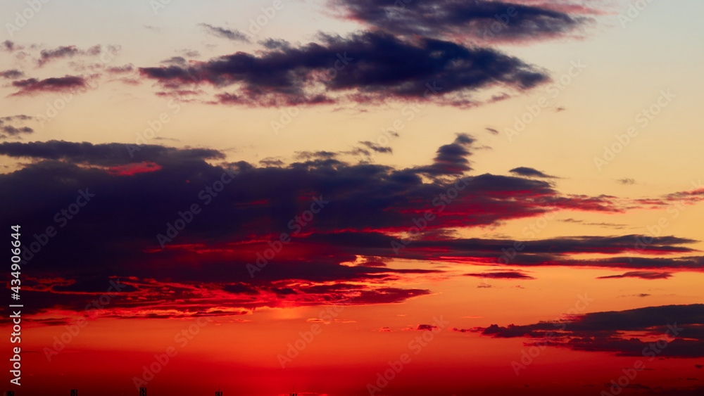 background of red dramatic beautiful sunset over the city