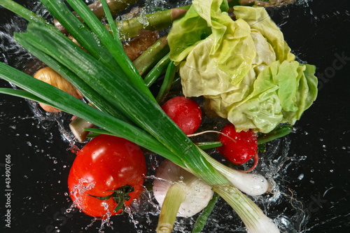 Various vegetables on black...