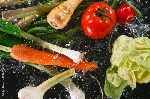 Various vegetables on black...