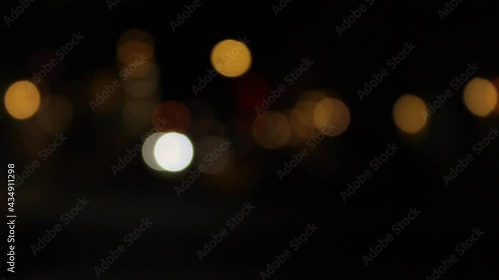 beautiful glittering Circular shape out of focus or blurred bokeh of car and city light on street. Defocused night light. Abstract concept beautiful glittering Circular shape out of focus or blurred bokeh of car and city light on street. Defocused night light. Abstract concept
