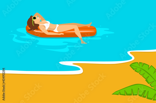 woman relaxing sunbathing on beach vacation, swimming on inflatable mattress in the sea