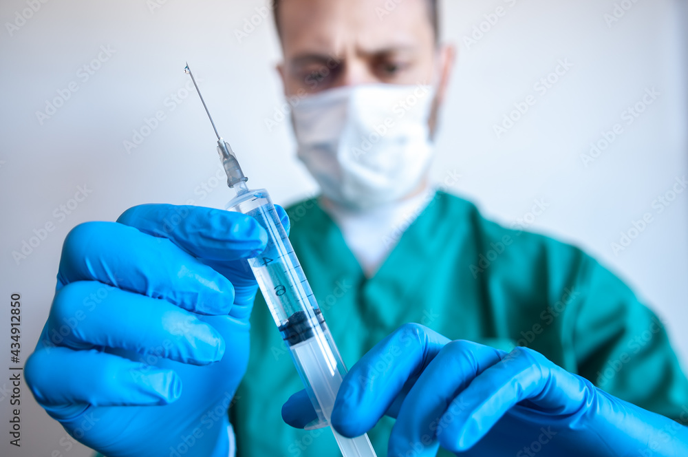 Nurse with a vaccine in his hands Nurse with a vaccine in his hands