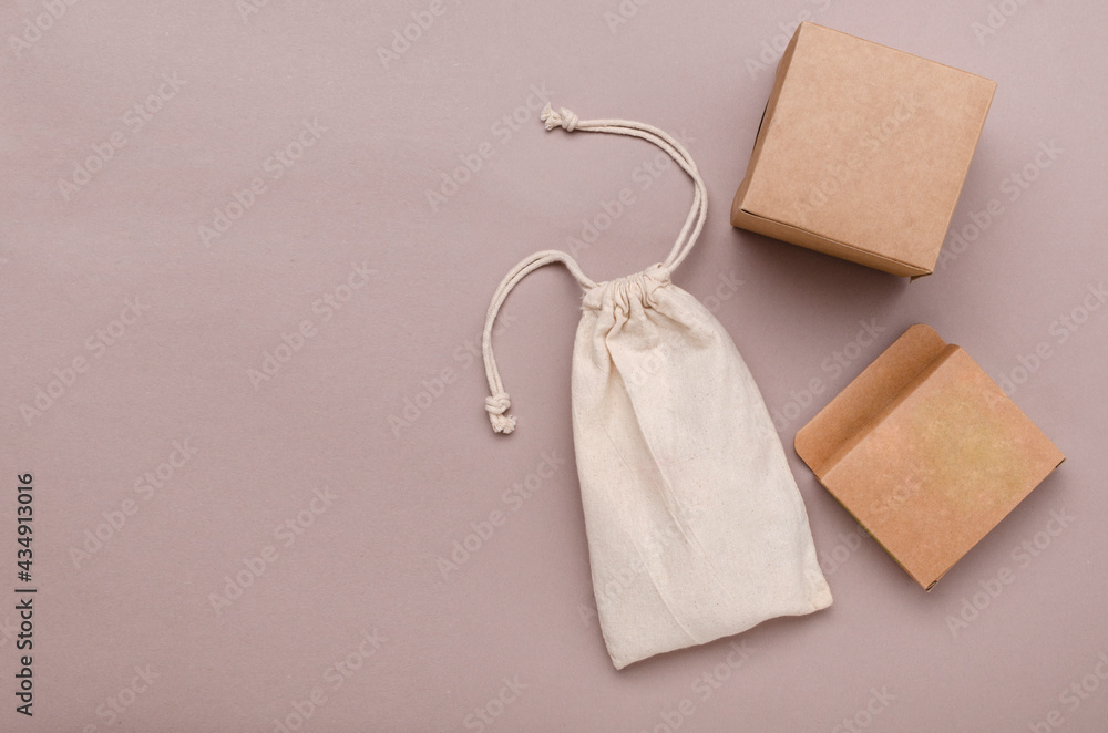 Top view of cloth bag, cardoard boxes for plastic free packaging on the