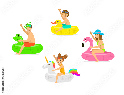 family; man woman; parents and children on summer time vacation running on the beach with inflatable floating swimming mattress and rings; isolated