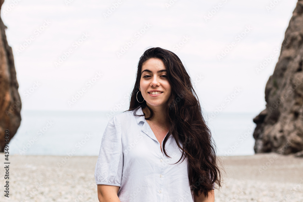 beautiful woman white dressed in a pebble beach beautiful woman white dressed in a pebble beach