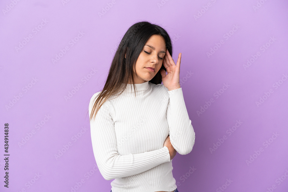 Young caucasian woman isolated on purple background with headache Young caucasian woman isolated on purple background with headache