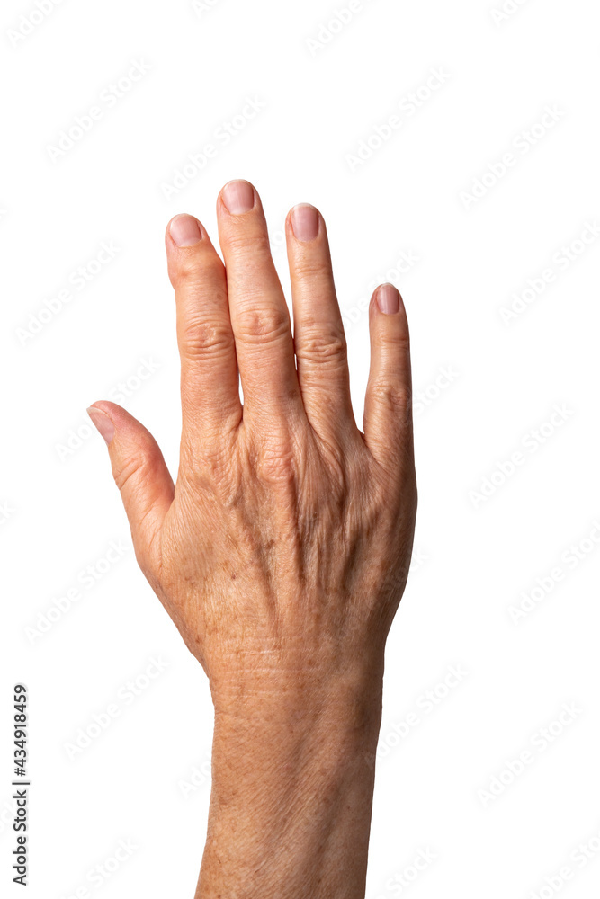 Hand of elderly Caucasian woman with Heberden's arthritis at the index finger on white background. Deformity of finger due to bony swellings in distal interphalangeal joint. Sign of osteoarthritis.