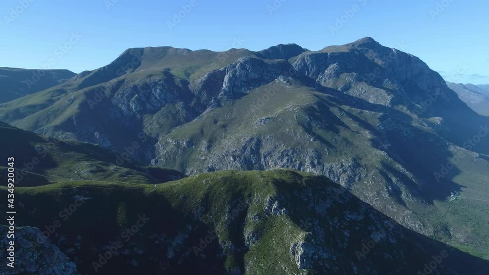Aerial - Drone pulls away, and reveals unique sandstone mountains, scenic view Aerial - Drone pulls away, and reveals unique sandstone mountains, scenic view