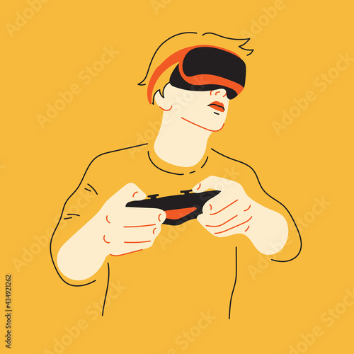 Gamer. Young man playing game, virtual reality, vrglasses. photo