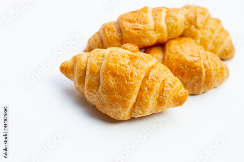 Tasty croissants on white background.