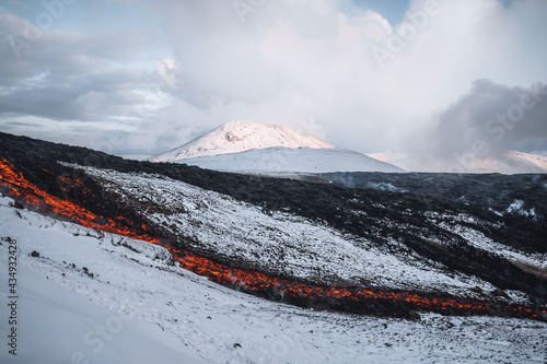 Iceland Volcanic eruption 2021. The volcano Fagradalsfjall is located in the valley Geldingadalir close to Grindavik and Reykjavik. Hot lava and magma coming out of the crater. photo