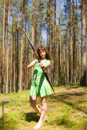girl archer in the forest