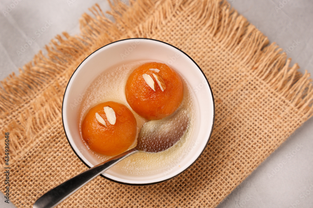 Indian sweet food Gulab jamun , gulaab jamun, jam Egyptian Zalabia balls dessert mithai freshly fried in sugar syrup or sprinkled with powdered sugar. Prepare use milk solids on Ramadan, Diwali India Indian sweet food Gulab jamun , gulaab jamun, jam Egyptian Zalabia balls dessert mithai freshly fried in sugar syrup or sprinkled with powdered sugar. Prepare use milk solids on Ramadan, Diwali India