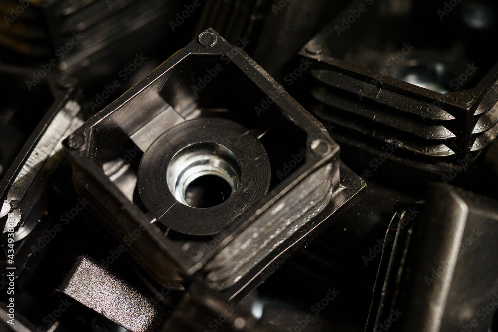 Black plastic tap inserts with nut inside. Black plastic tap inserts with nut inside.