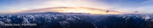 Aerial Panoramic View from Airplane of Canadian Mountain Landscape. Colorful Spring Sunset. Pitt Lake near Vancouver, British Columbia, Canada. Nature Backgrorund Panorama