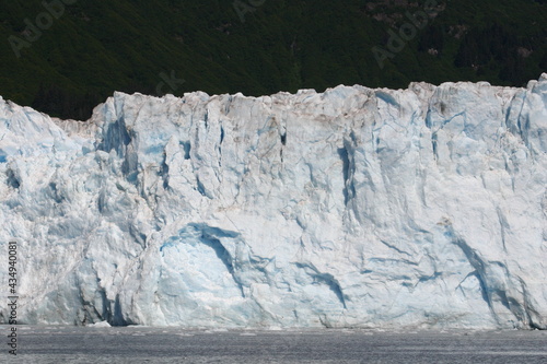 Alaska Iceberg Reaching the Shore and getting Ready to Calve and Make Icebergs as the Chunks Brake Off and Fall into the Ocean