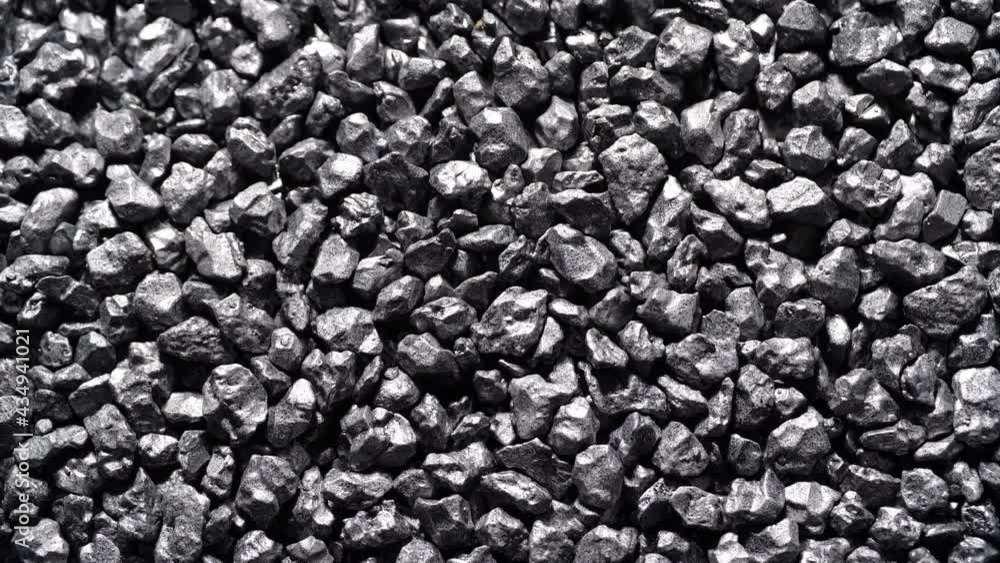 Stone ore close-up. Black stones grunge background. Stone ore close-up. Black stones grunge background.