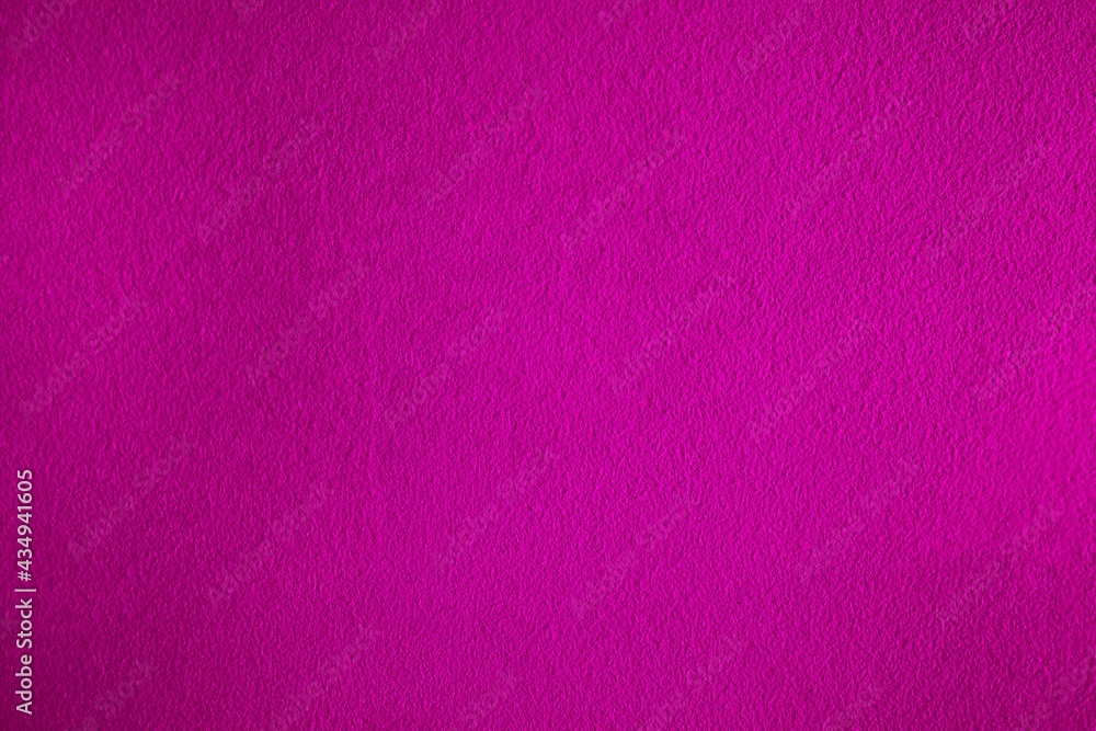 Fototapeta premium Plain fuschia textured dark to light gradient background. Vivid purplish red backdrop with space for text. Good for wallpaper, presentation, bright color advertisements and color theme designs.