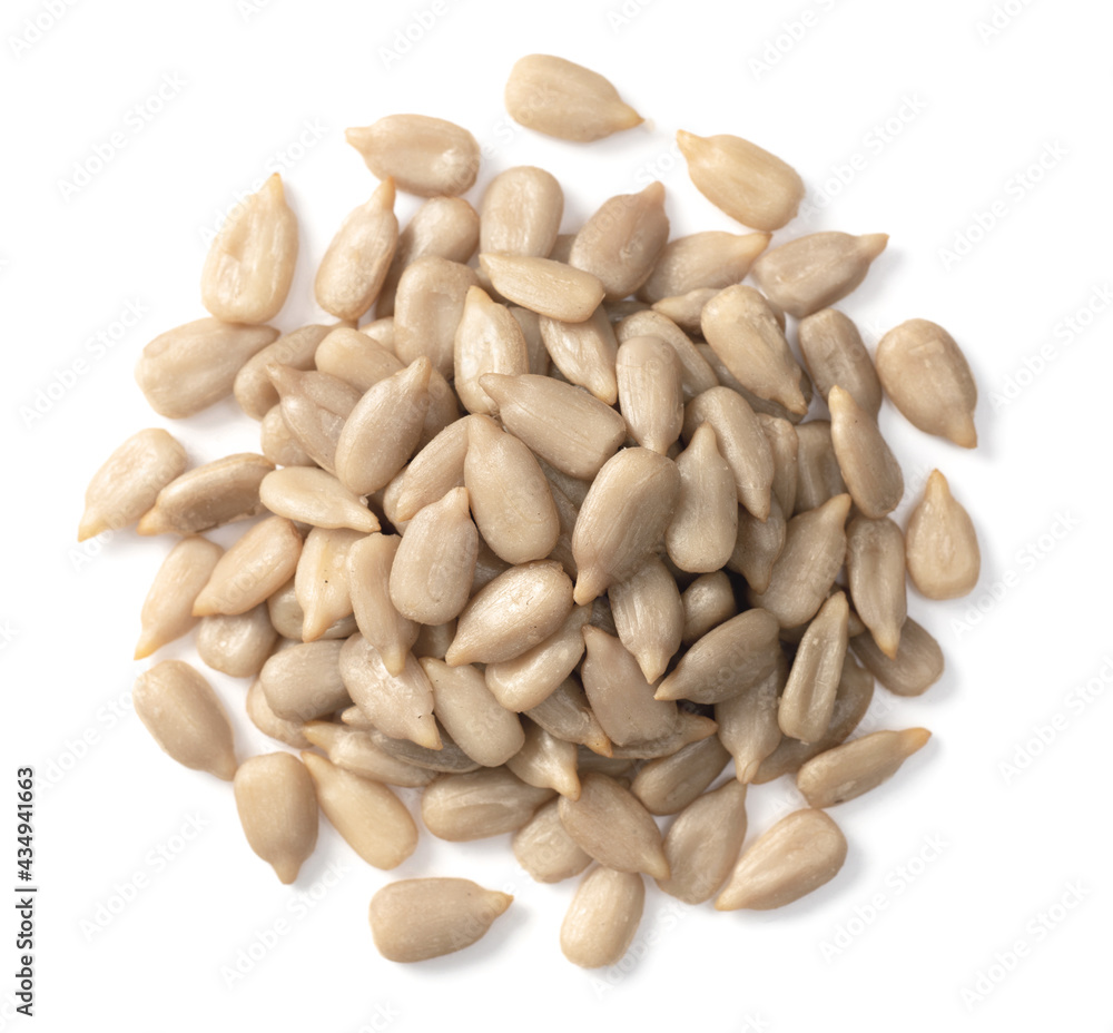 peeled sunflower seeds isolated on white background, top view