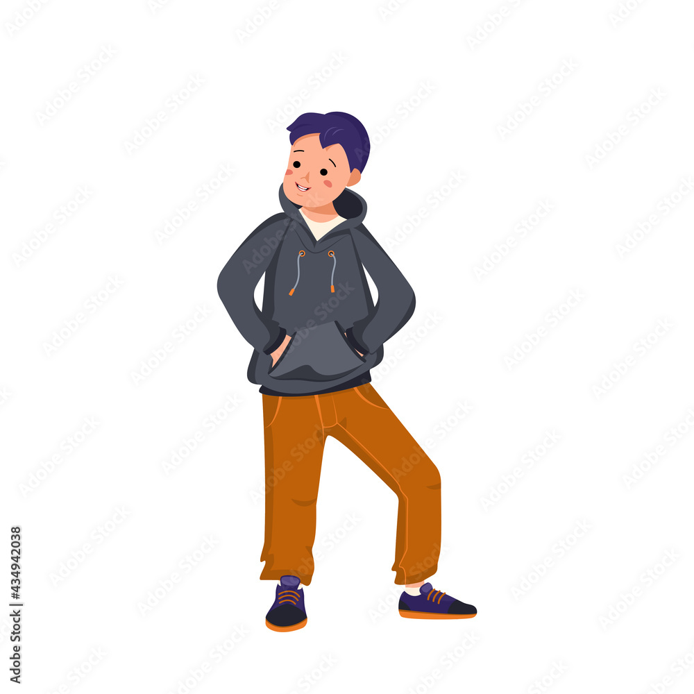 Boy in a hoodie, jeans and sneakers stands and smiles. Happy child holds his hands in the poop. Teenager with face and eyes in casual clothes. World International children day Boy in a hoodie, jeans and sneakers stands and smiles. Happy child holds his hands in the poop. Teenager with face and eyes in casual clothes. World International children day
